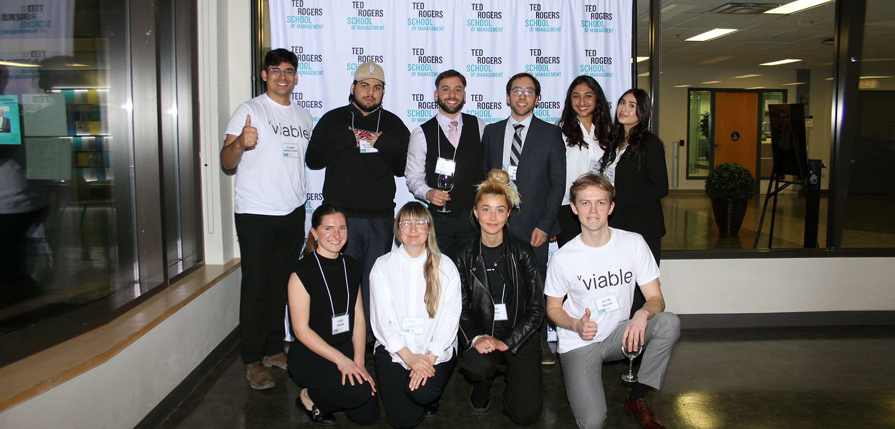 Slaight Competition participants posing for the camera as a team