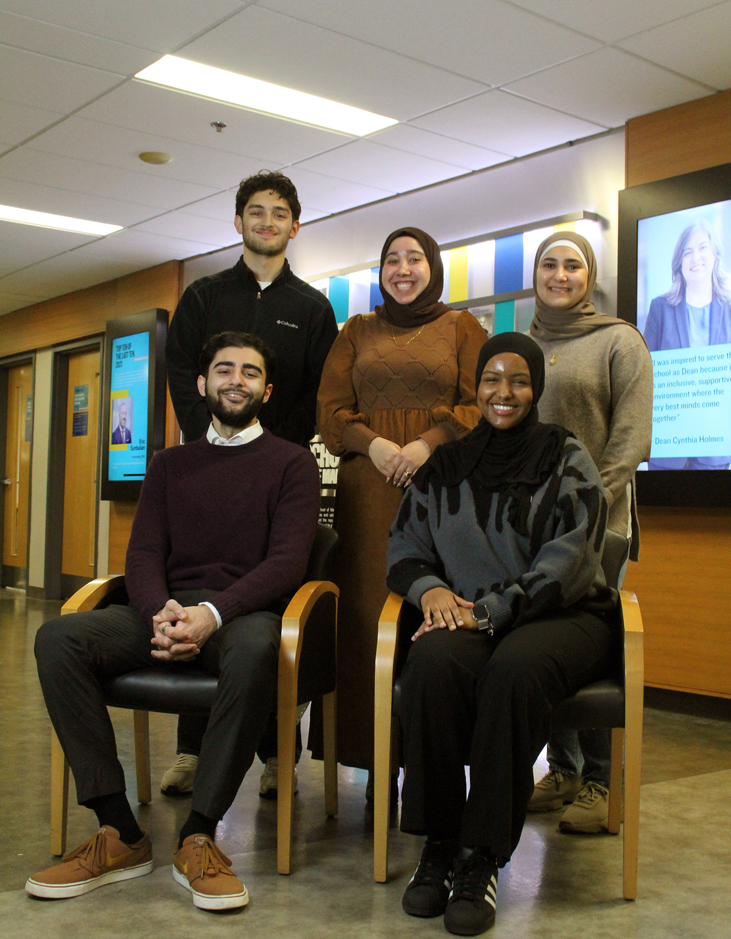 Five members of the TRSS posing for the camera as a group